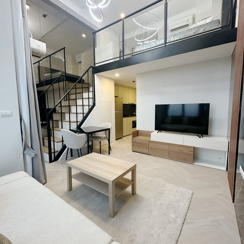 Living room — Duplex 1-bedroom condo at Siamese Sukhumvit 48, On Nut, Bangkok