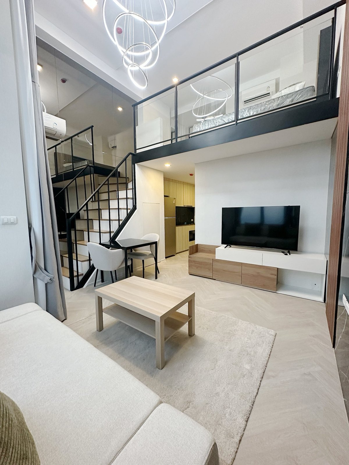 Living room — Duplex 1-bedroom condo at Siamese Sukhumvit 48, On Nut, Bangkok