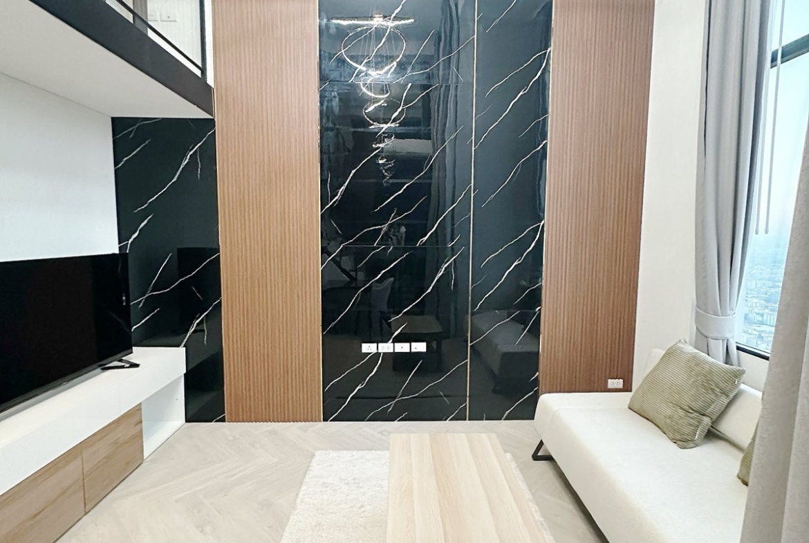 Living room — Duplex 1-bedroom condo at Siamese Sukhumvit 48, On Nut, Bangkok