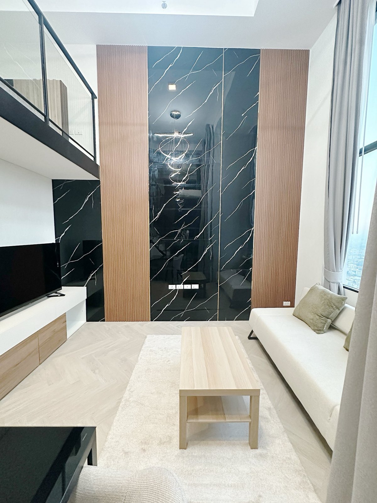 Living room — Duplex 1-bedroom condo at Siamese Sukhumvit 48, On Nut, Bangkok